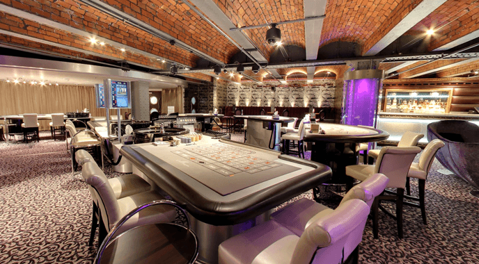 The stylish and modern interior of Manchester235 casino.